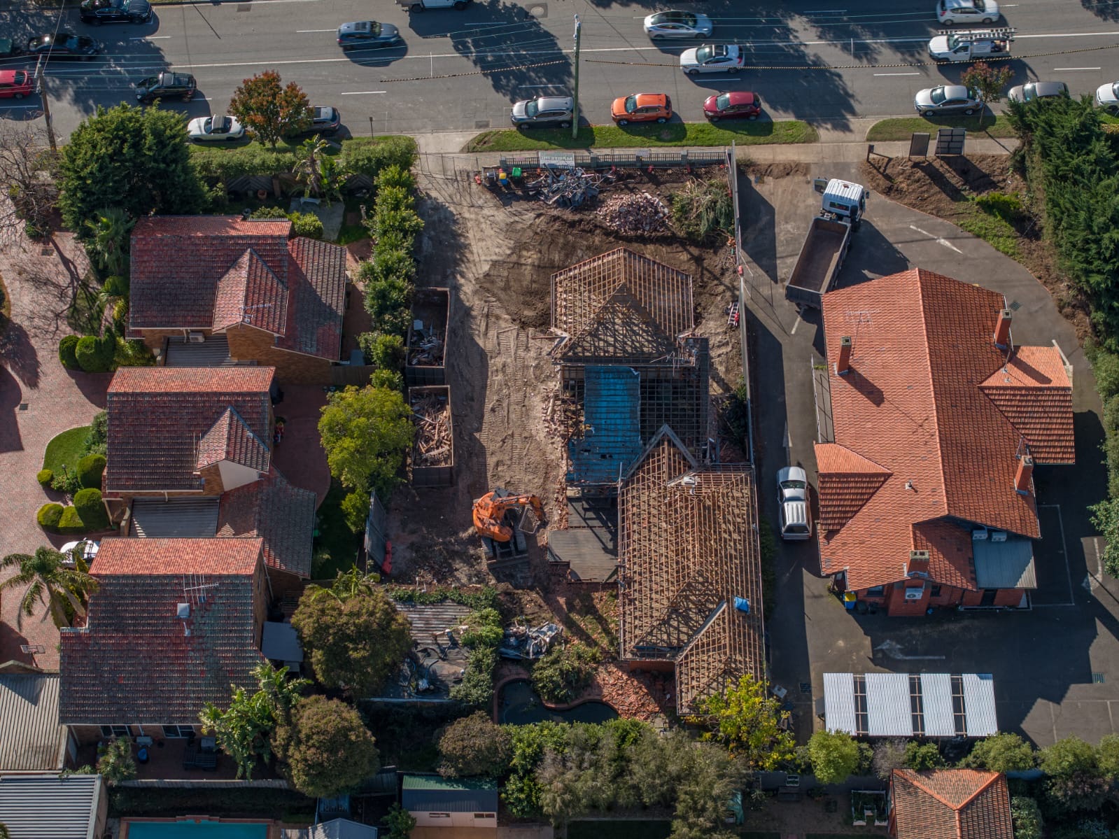 Aerial drone view of a partial demolition project between Melbourne properties